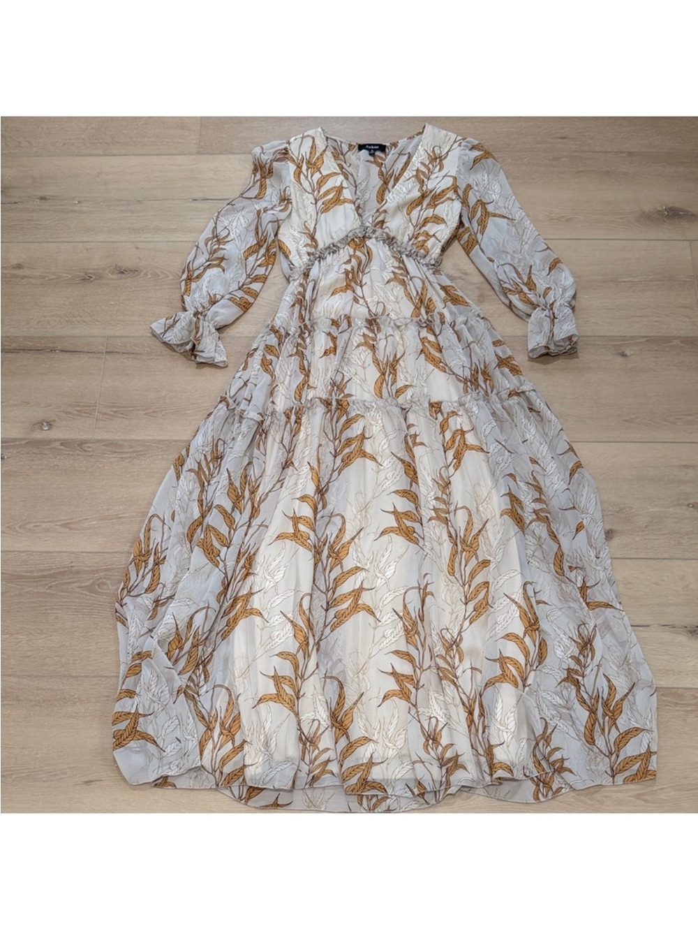 Red Dress Boutique Cream Maxi Dress with Leaf Print - Aakaa